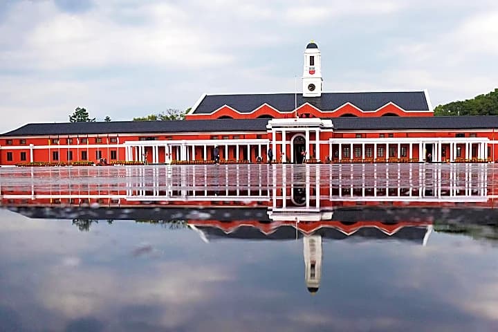 Indian Military Academy campus with historic buildings and parade grounds
